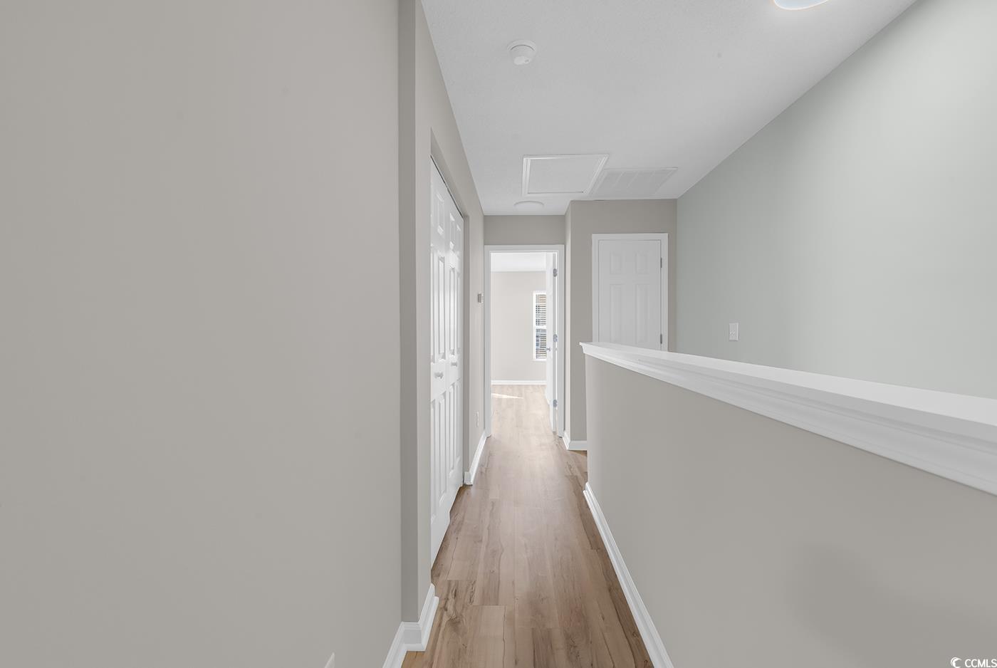 308 Kiskadee Loop, Unit E Conway, SC 29526 - Photo 22 of 36 Hall with light wood finished floors and attic access