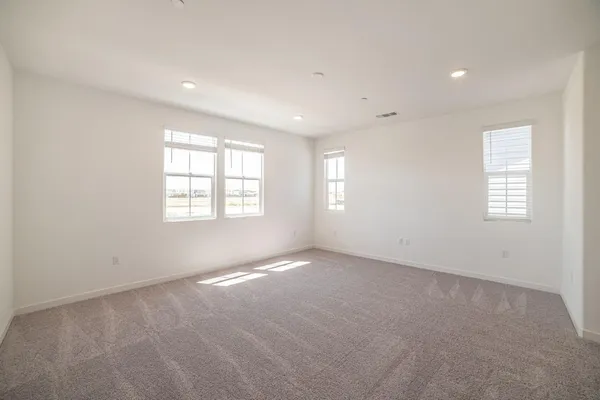 an empty room with a natural light