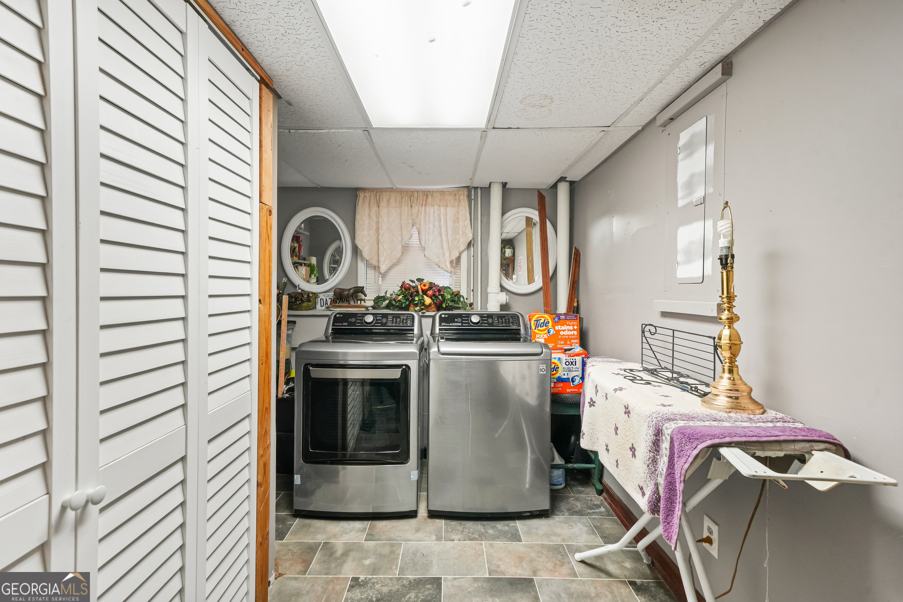 3111 Octavia Lane Snellville, GA 30039 - Photo 17 of 42 a utility room with sink dryer and washer