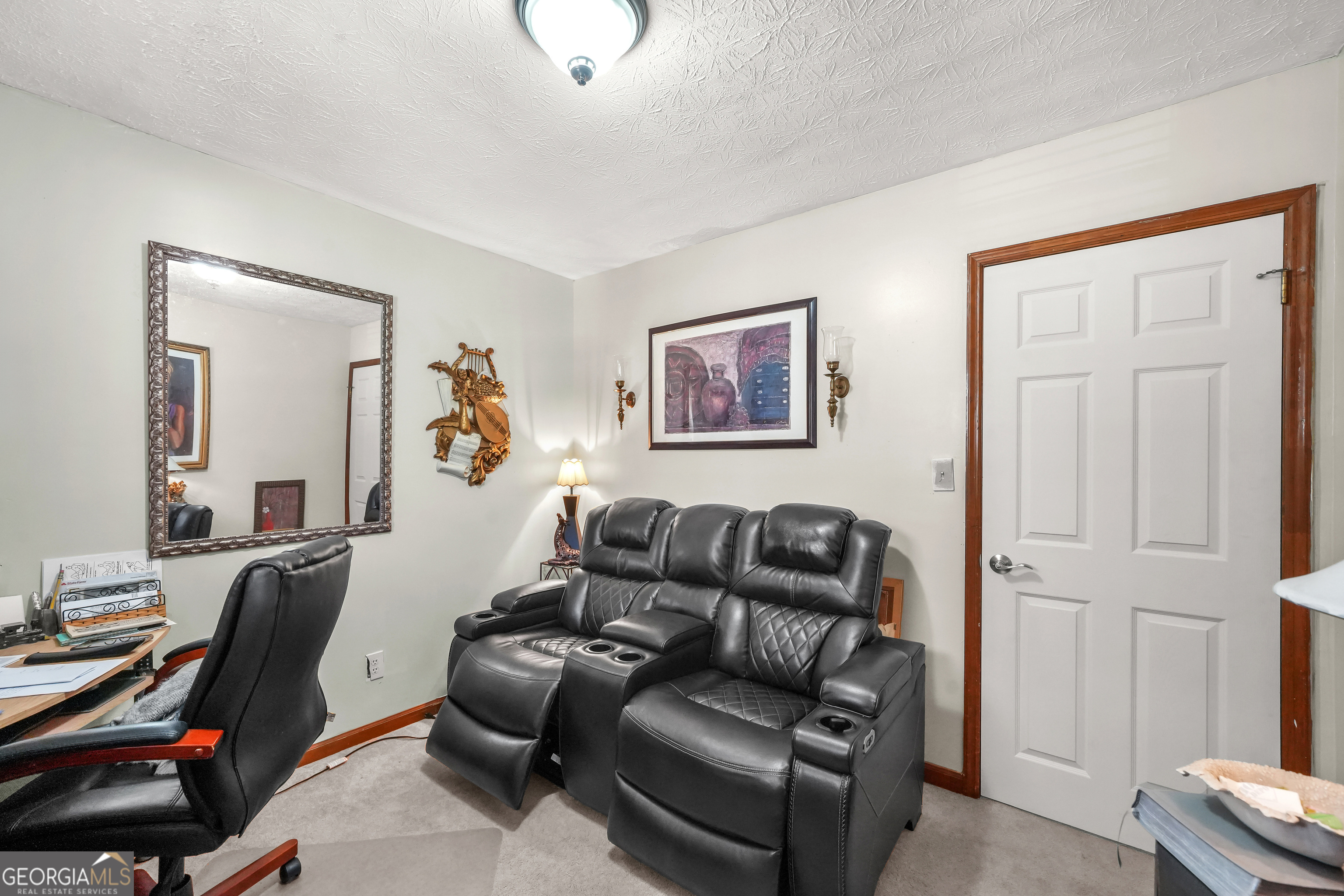 3111 Octavia Lane Snellville, GA 30039 - Photo 26 of 42 a living room with furniture a flat screen tv and a window