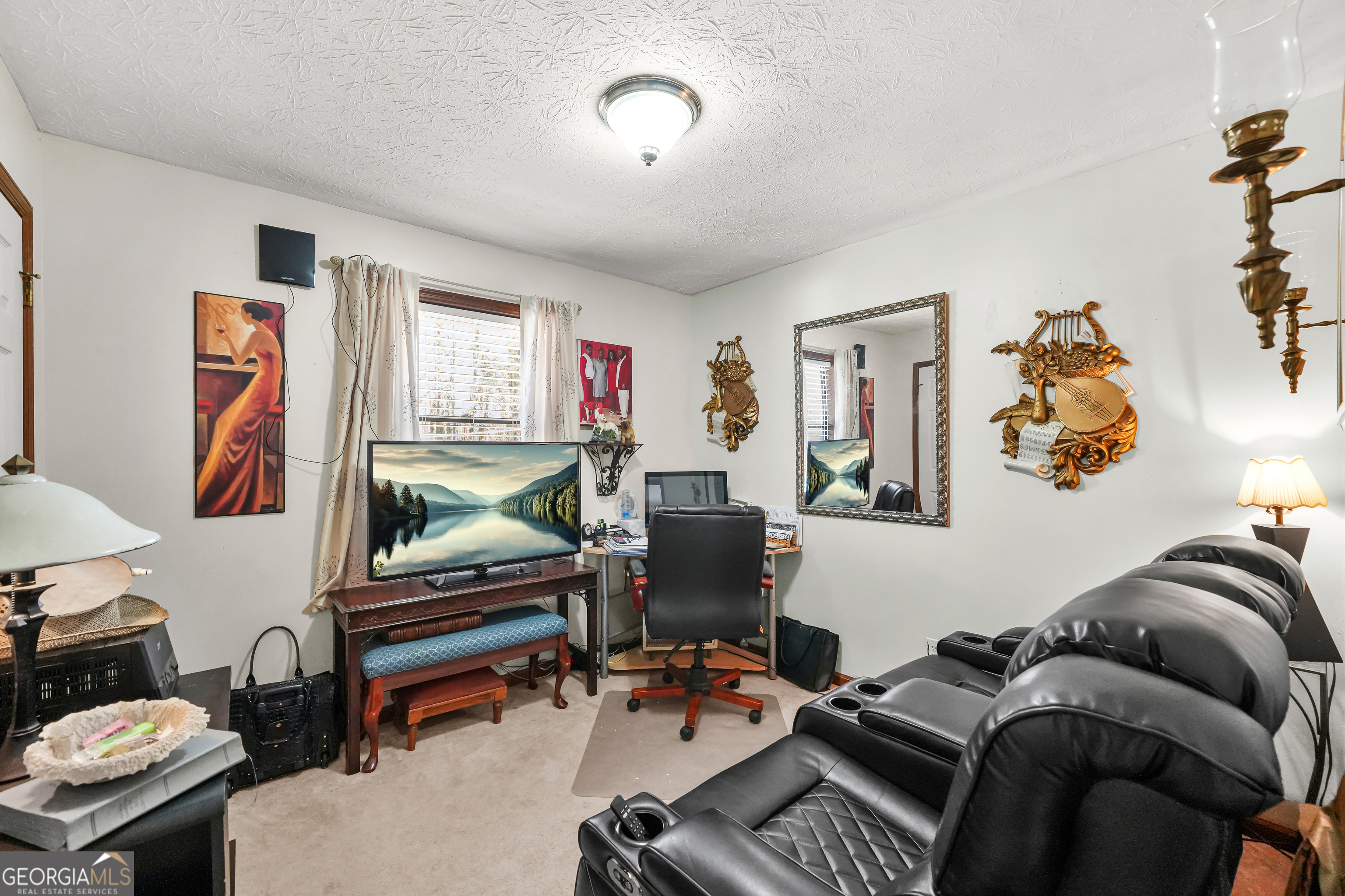 3111 Octavia Lane Snellville, GA 30039 - Photo 27 of 42 a living room with furniture and a window