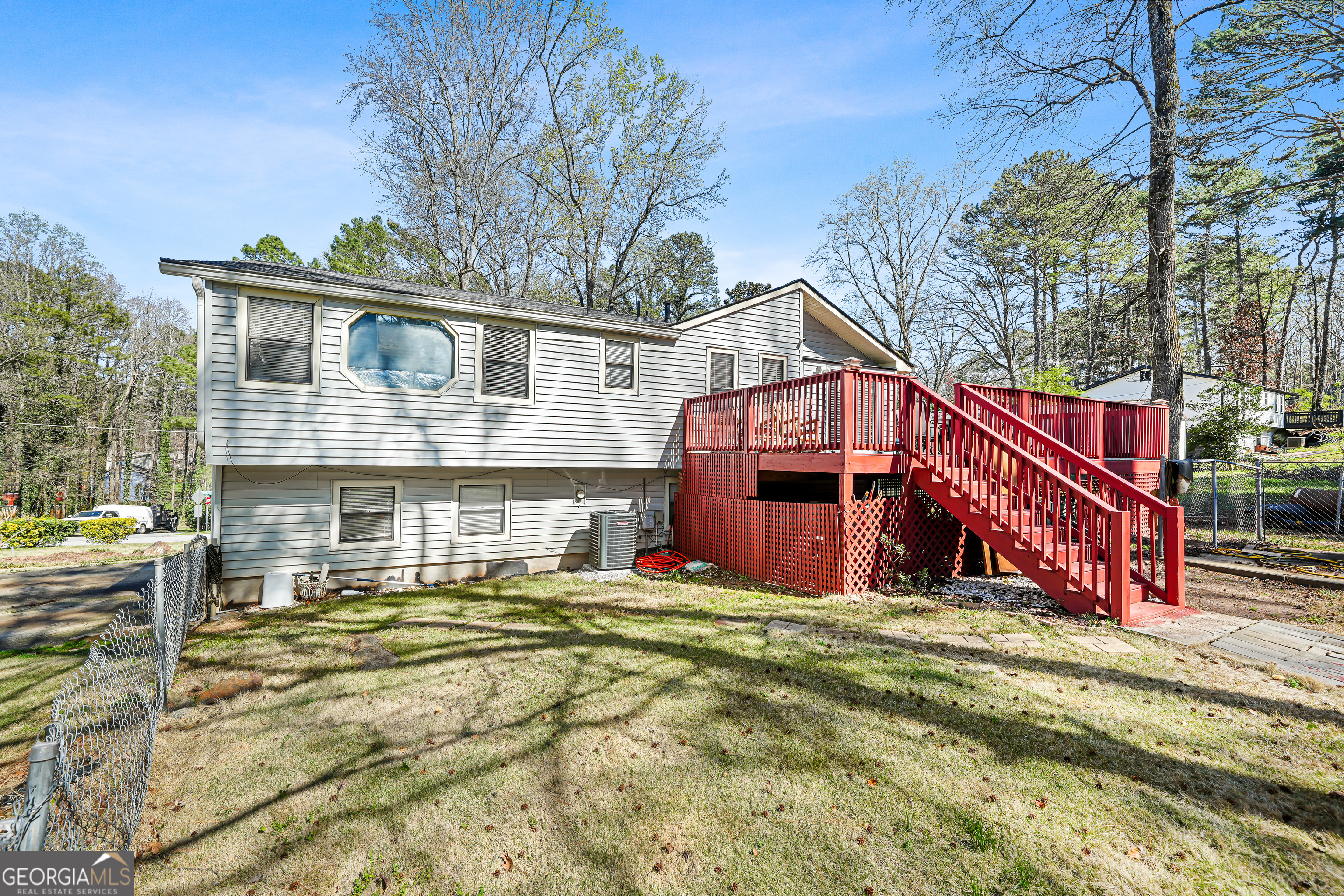 3111 Octavia Lane Snellville, GA 30039 - Photo 40 of 42 a view of a house with a big yard and large trees