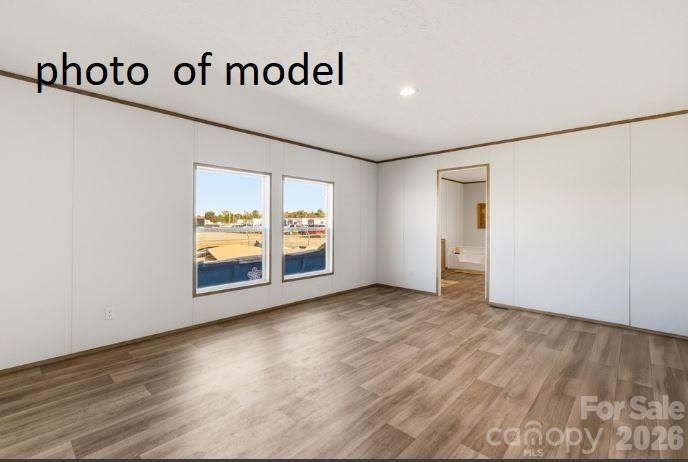 877 Biggerstaff Loop, Unit E Nebo, NC 28761 - Photo 9 of 26 a view of an empty room with window