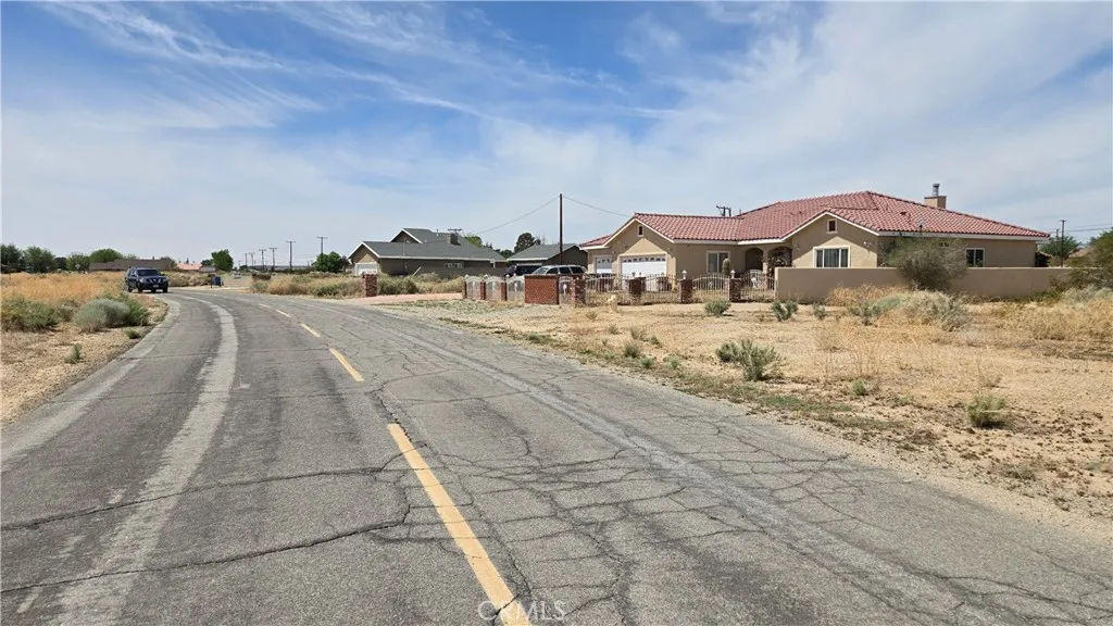0 Calhoun Drive Edwards, CA 93523 - Photo 13 of 22 a view of a house with a yard