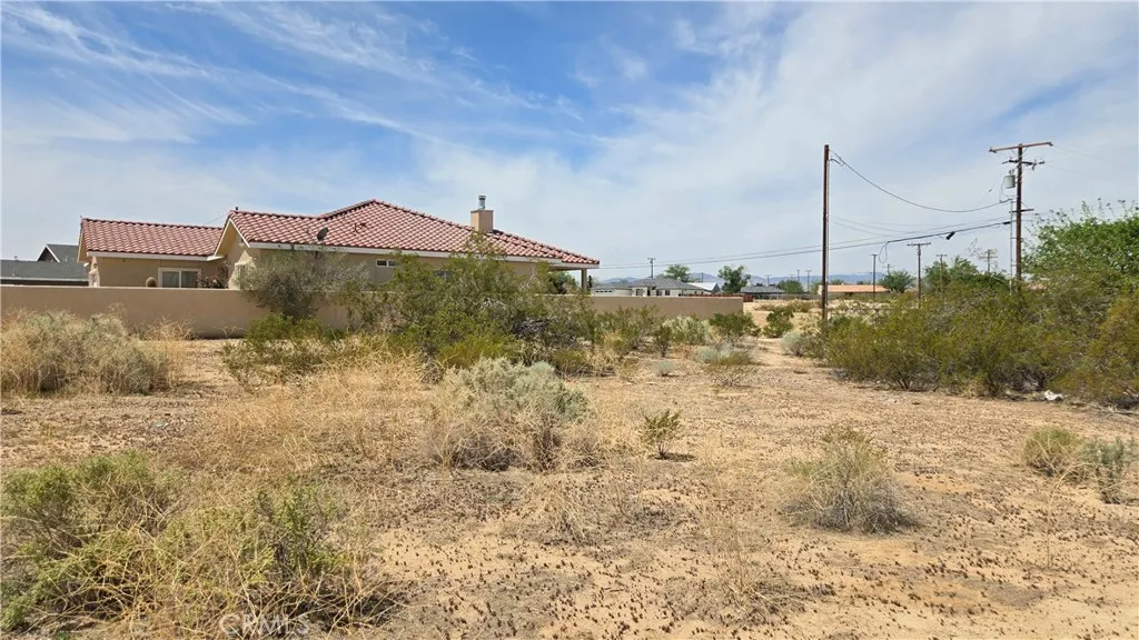 0 Calhoun Drive Edwards, CA 93523 - Photo 17 of 22 a view of a house with a yard