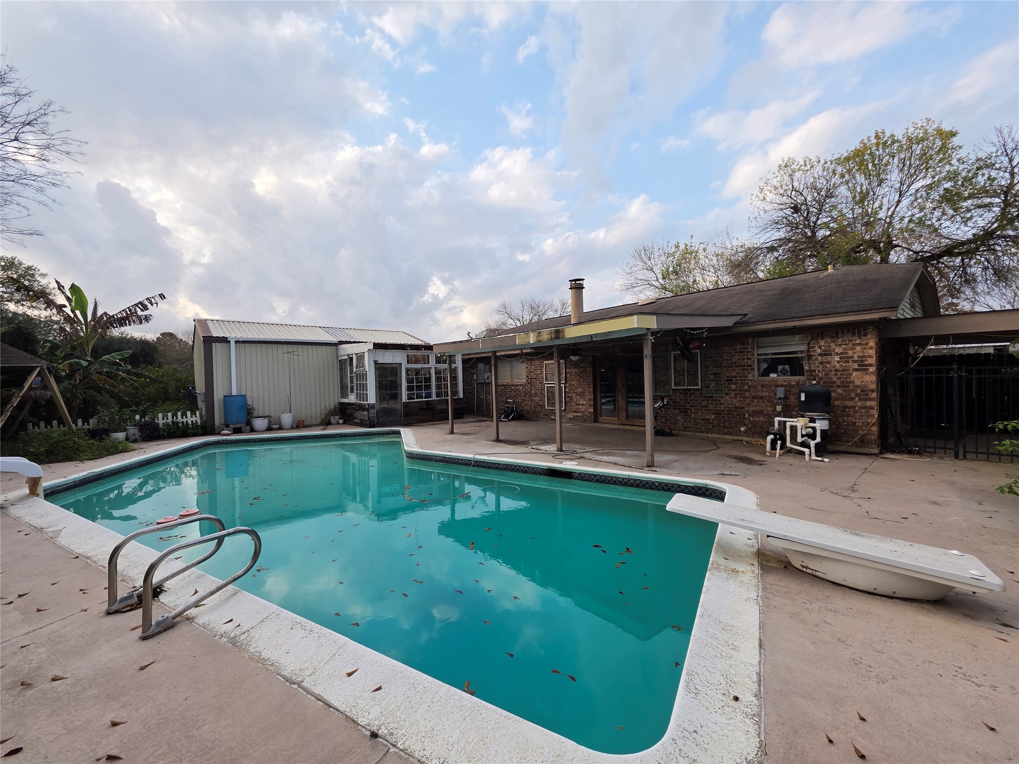 2414 Goldenrod Street Highlands, TX 77562 - Photo 17 of 22 a view of a backyard with sitting area
