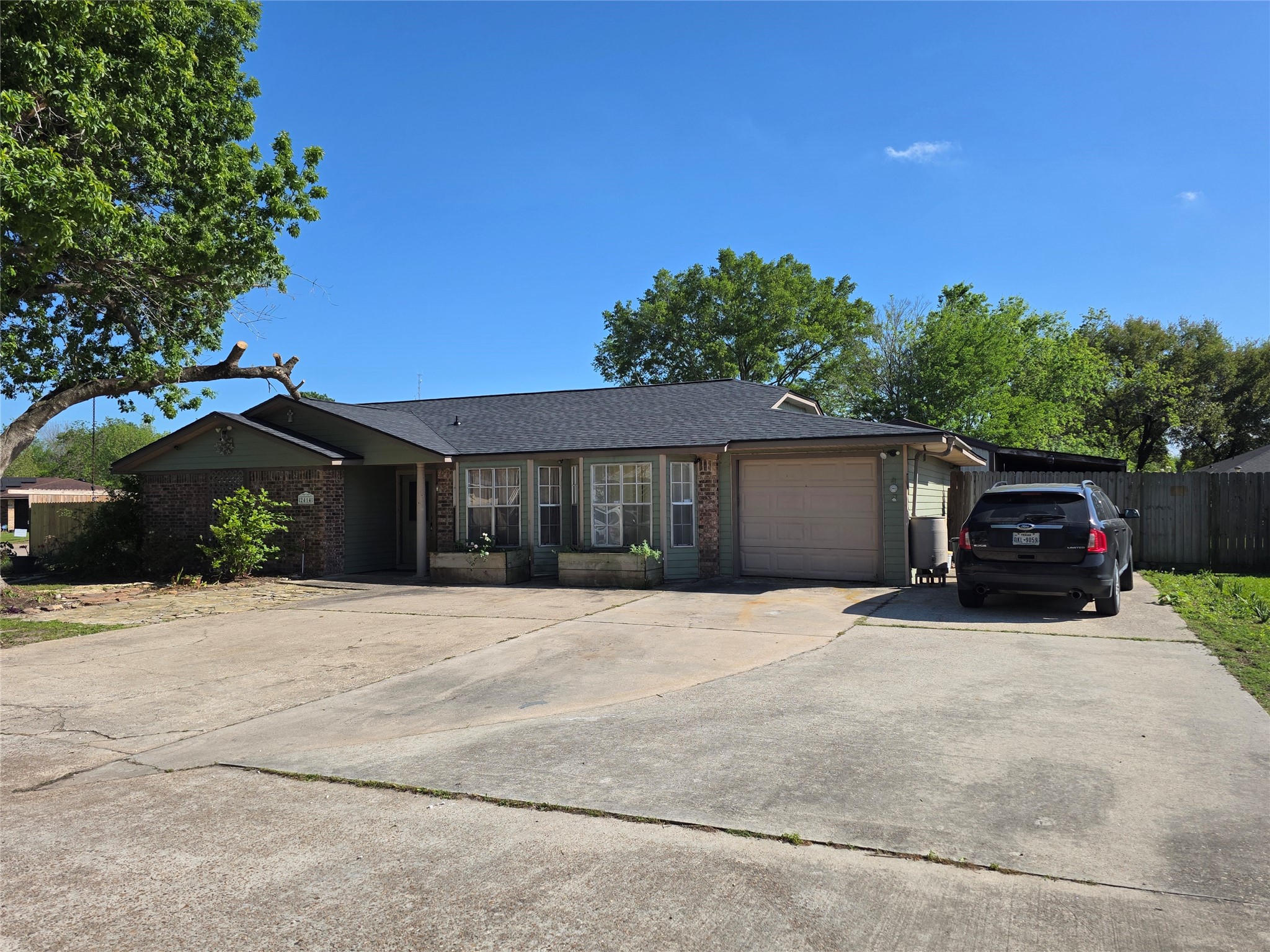 2414 Goldenrod Street Highlands, TX 77562 - Photo 2 of 22 a house view with a outdoor space