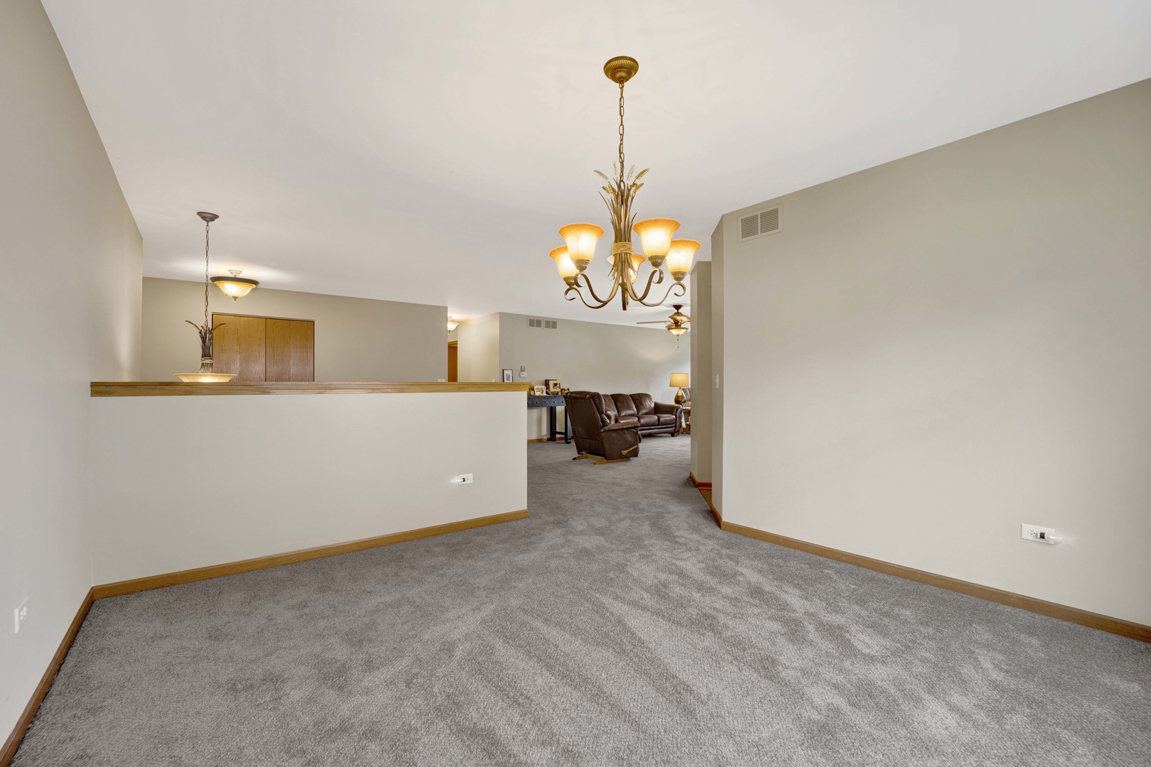 3904 Stockton Drive Joliet, IL 60421 - Photo 14 of 33 a view of a room with a chandelier