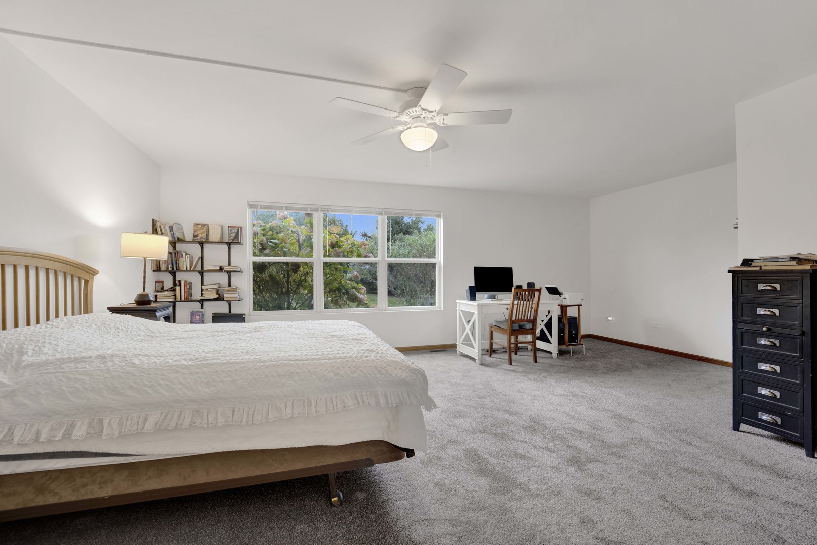 3904 Stockton Drive Joliet, IL 60421 - Photo 19 of 33 a bedroom with a bed and a large window