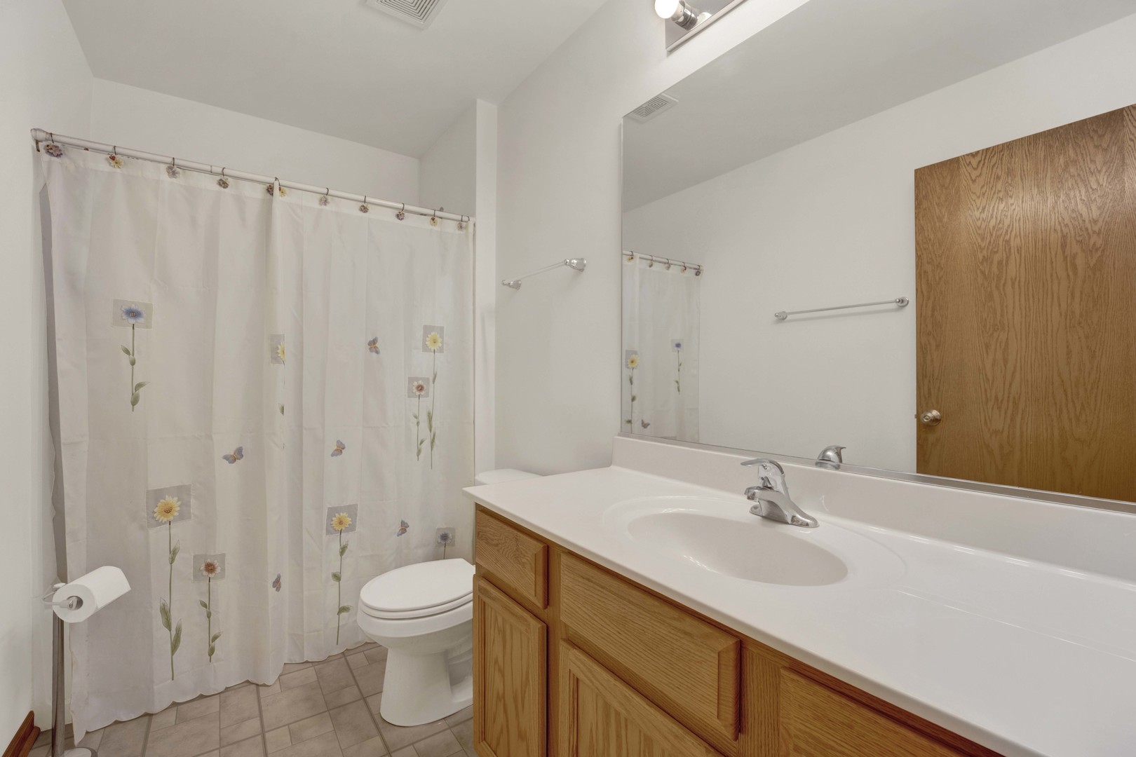 3904 Stockton Drive Joliet, IL 60421 - Photo 26 of 33 a bathroom with a sink a toilet and shower