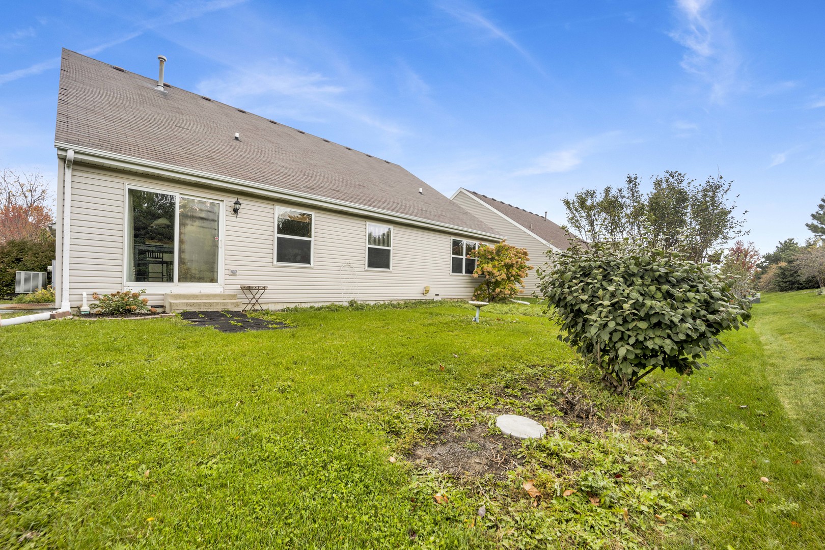 3904 Stockton Drive Joliet, IL 60421 - Photo 31 of 33 a view of a house with backyard and garden