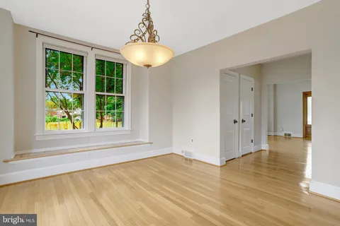 a kitchen with stainless steel appliances granite countertop a stove sink and microwave
