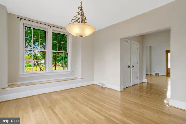 a kitchen with stainless steel appliances granite countertop a stove sink and microwave
