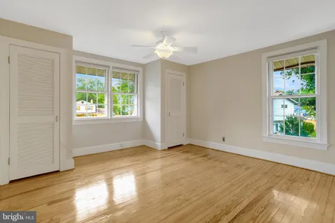 a view of a hallway with washer and dryer