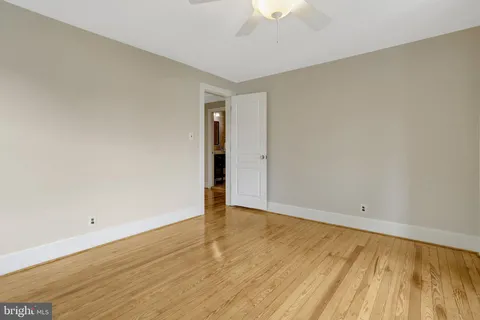 a bathroom with a toilet and a bathtub