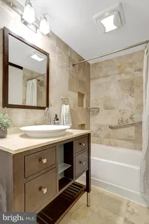 a view of a chair and table in backyard