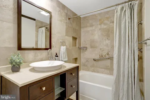 a view of a chairs and table in backyard