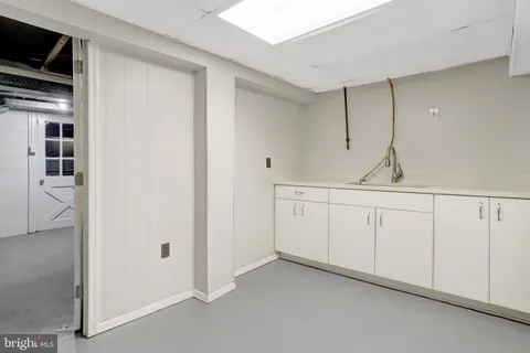 a view of a chairs and table in the patio