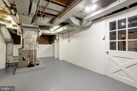 a view of a dinning room with a bench in patio
