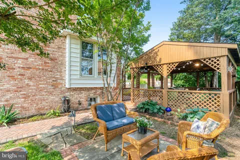a view of a white building with a outdoor space