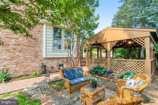 a view of a white building with a outdoor space