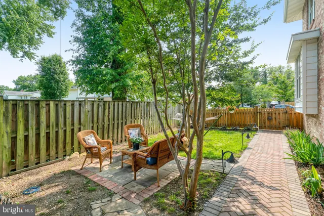 a view of a street with a building in the background