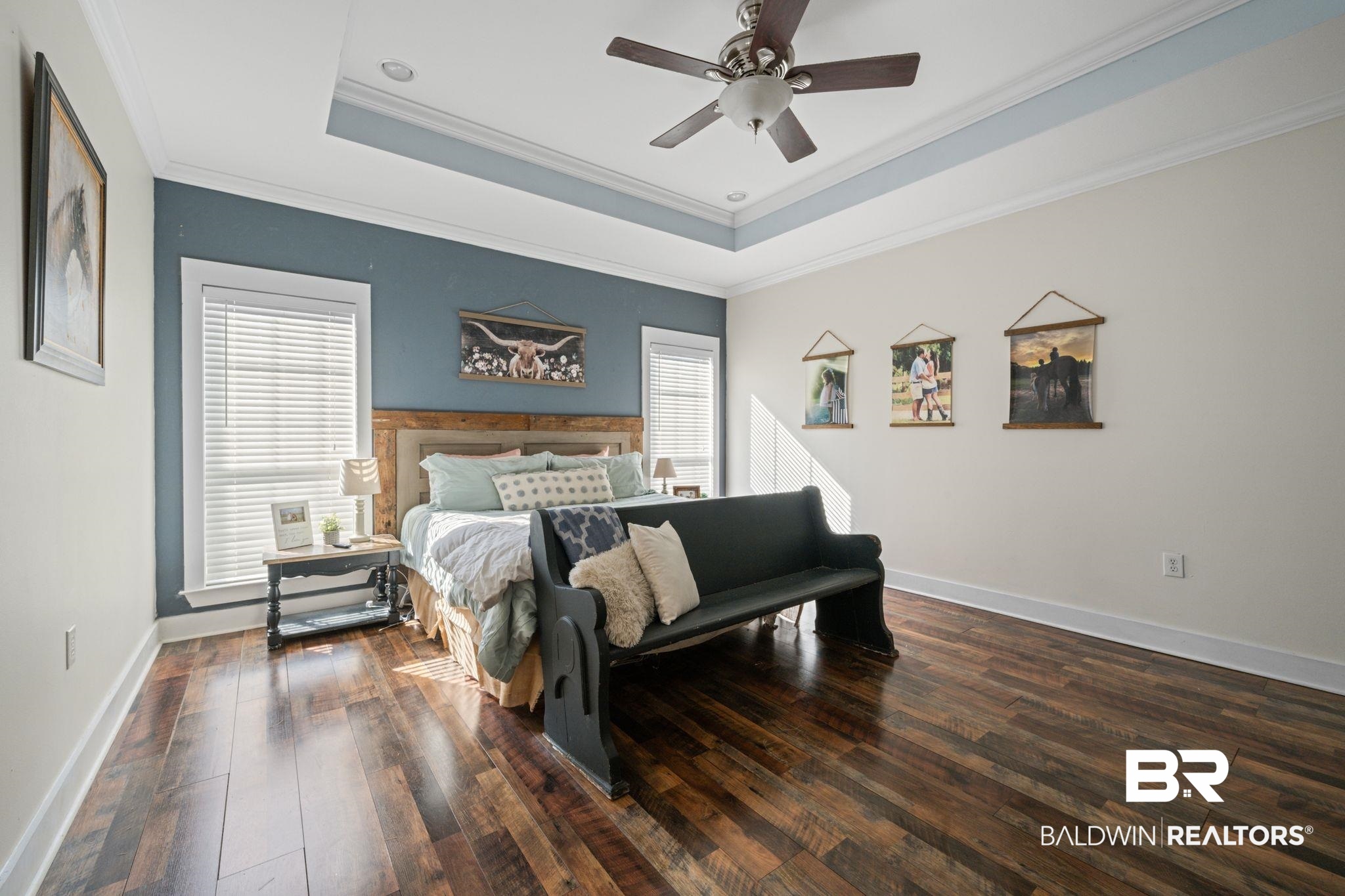 15635 North A N Brady Road Bay Minette, AL 36507 - Photo 20 of 51 Bedroom with ornamental molding, ceiling fan, a raised ceiling, and dark hardwood / wood-style flooring