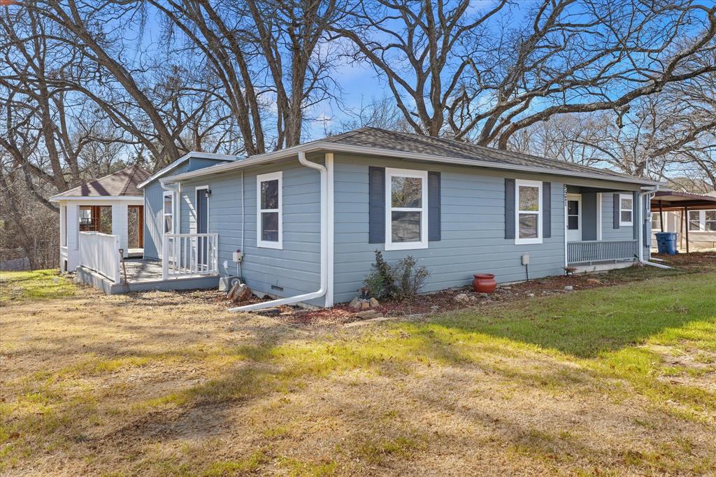 9521 Dalrock Road Rowlett, TX 75089 - Photo 2 of 38 a view of a house with snow on the side of the house