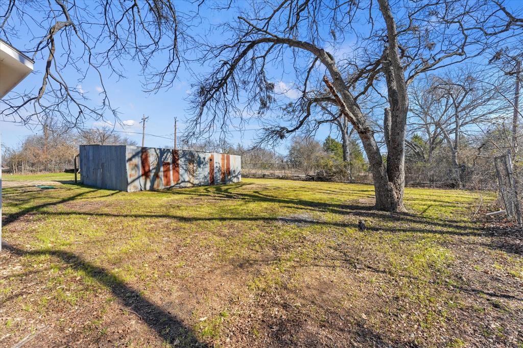 9521 Dalrock Road Rowlett, TX 75089 - Photo 28 of 38 a view of yard with tree