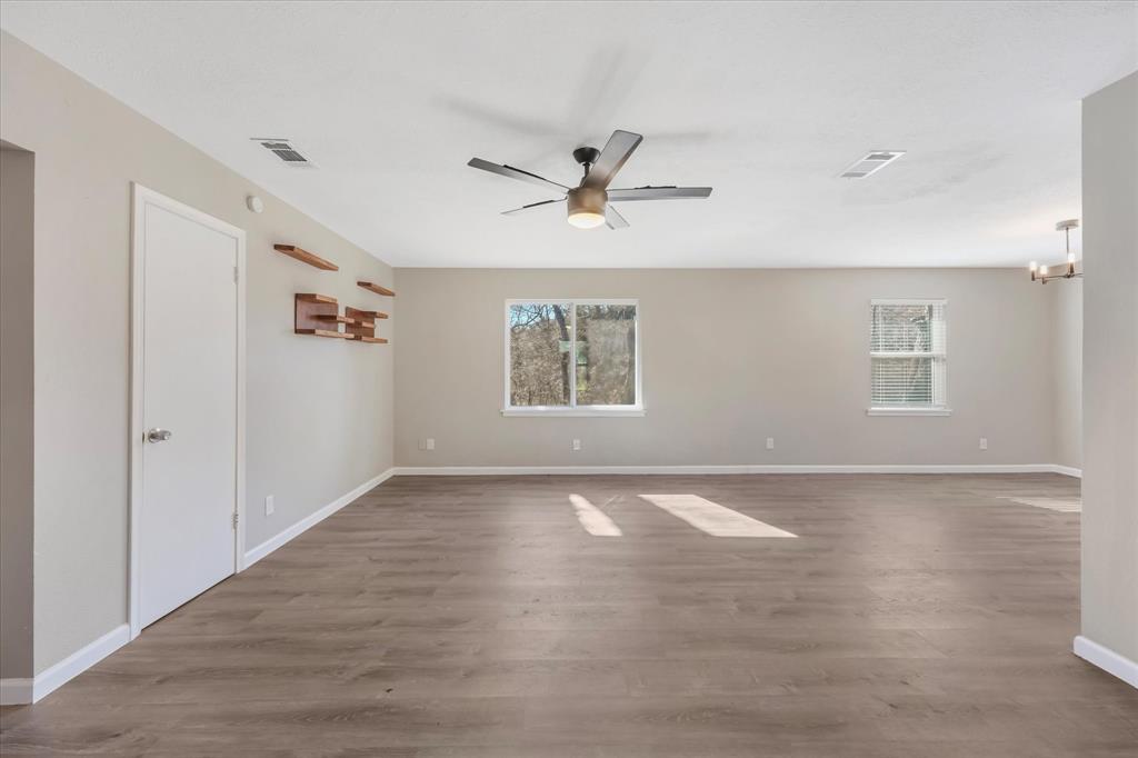 9521 Dalrock Road Rowlett, TX 75089 - Photo 3 of 38 a view of an empty room with a window