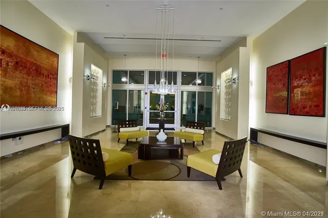 a living room with furniture windows and flat screen tv