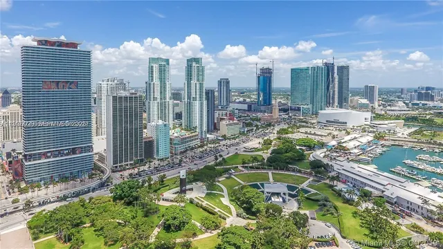 a view of a city with tall buildings