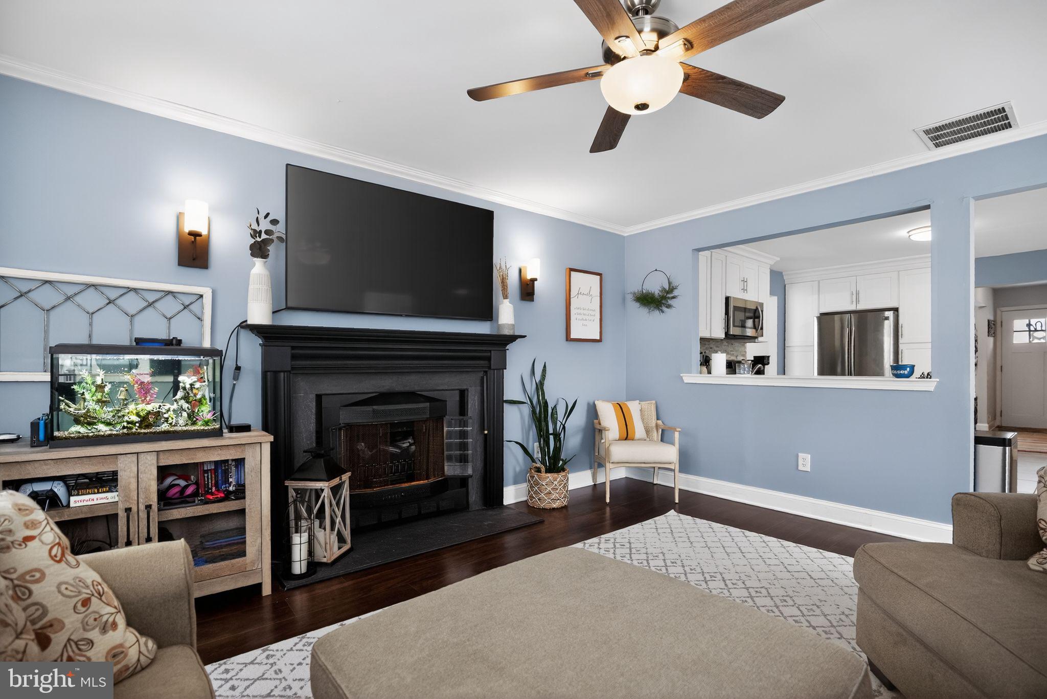 a bedroom with a bed and a fireplace