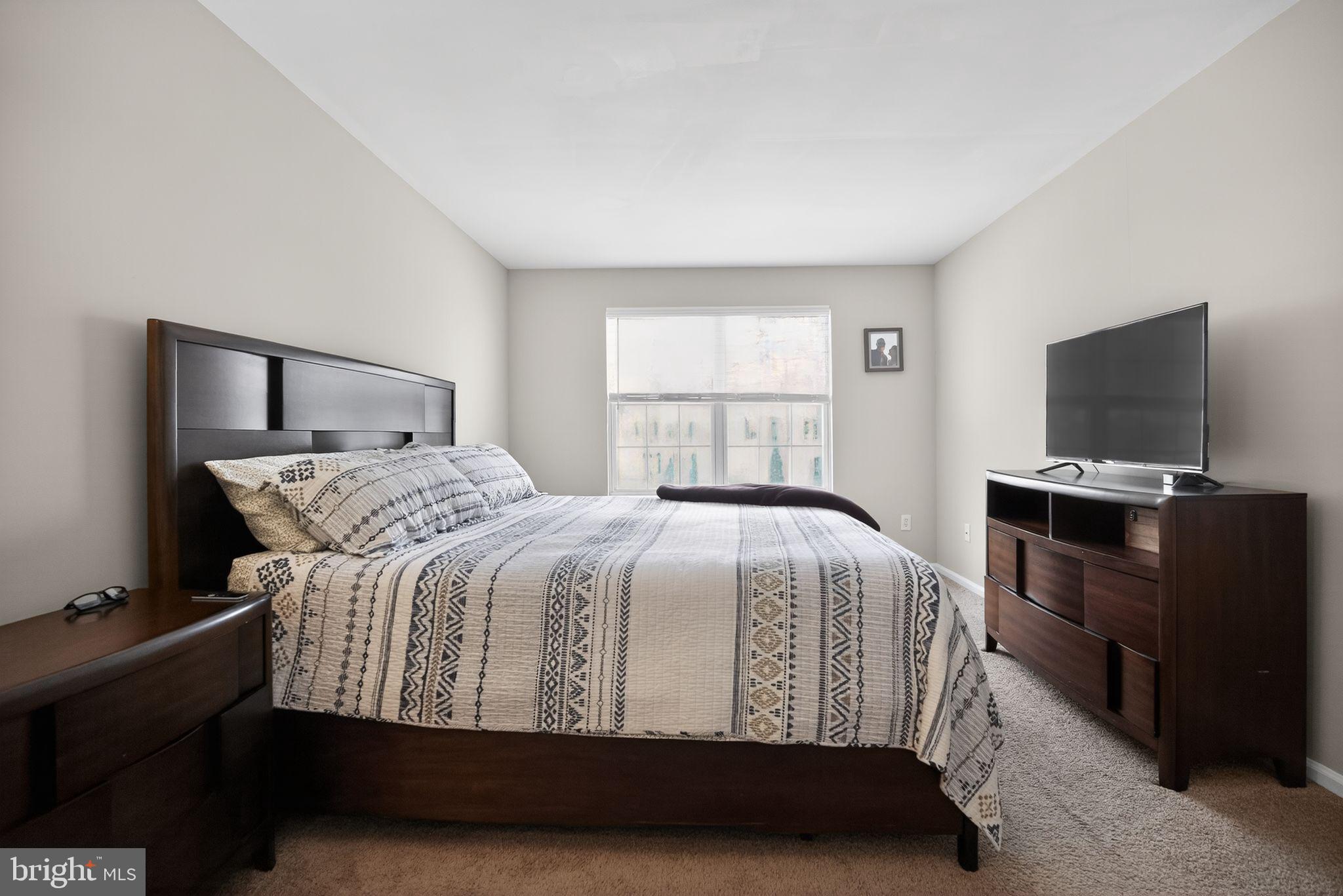 9 Bromley Court Atco, NJ 08004 - Photo 27 of 36 a bedroom with a bed and a flat screen tv