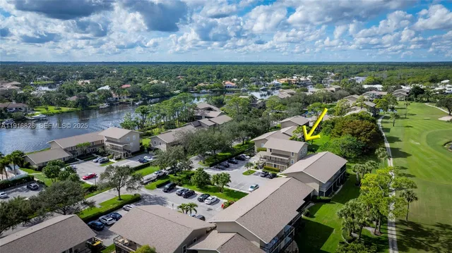 an aerial view of a house with a garden