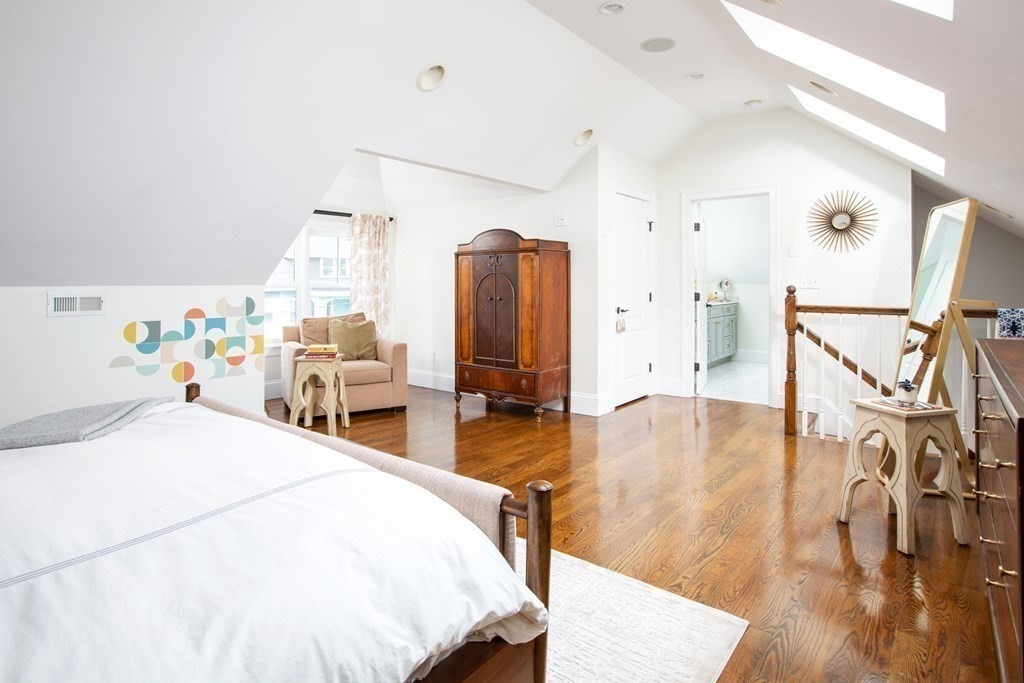 14 Castleton Street, Unit 2 Boston, MA 02130 - Photo 13 of 23 a bed room with furniture and wooden floor