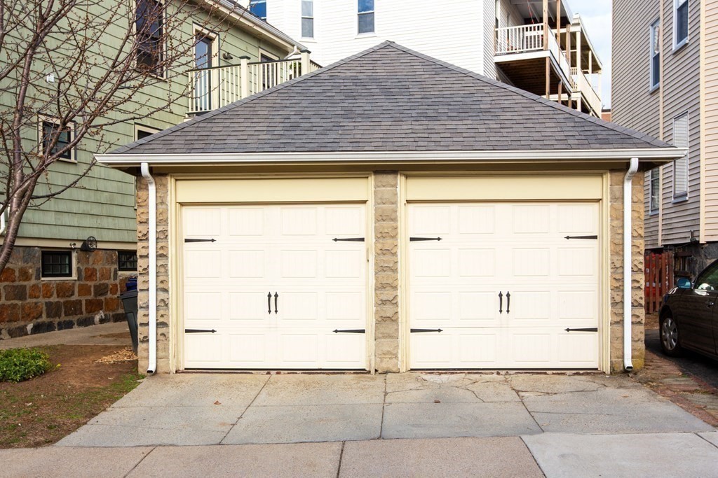 14 Castleton Street, Unit 2 Boston, MA 02130 - Photo 18 of 23 a view of a house with a garage