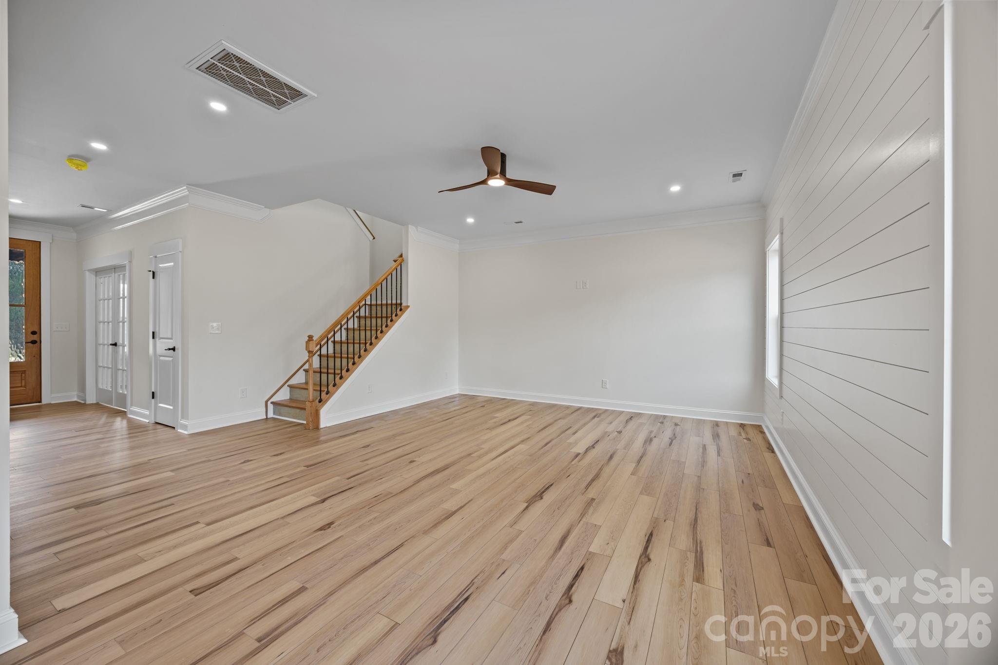 1050 Gibson Road Salisbury, NC 28147 - Photo 16 of 47 wooden floor in an empty room with a window