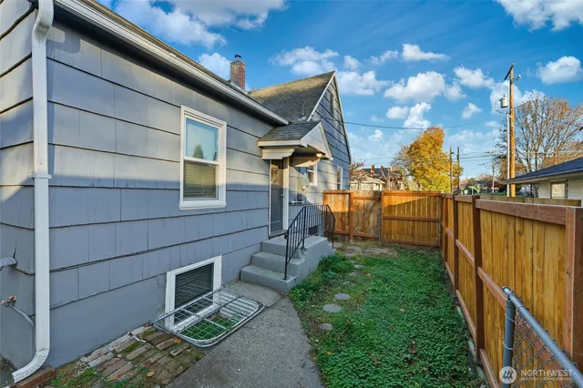 a view of a room with wooden walls