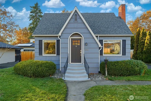 a front view of a house with garden