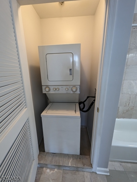 19 Market Street, Unit 405 Paterson, NJ 07501 - Photo 18 of 19 a utility room with dryer and washer