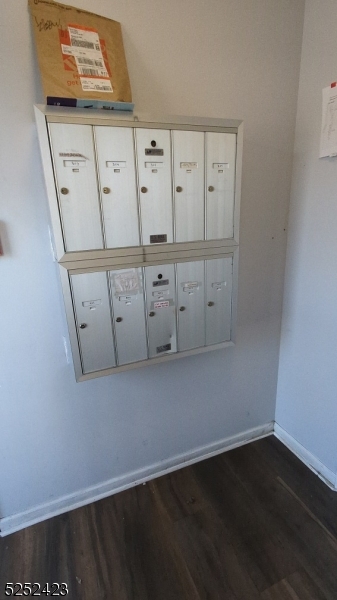 19 Market Street, Unit 405 Paterson, NJ 07501 - Photo 3 of 19 an empty room with cabinet