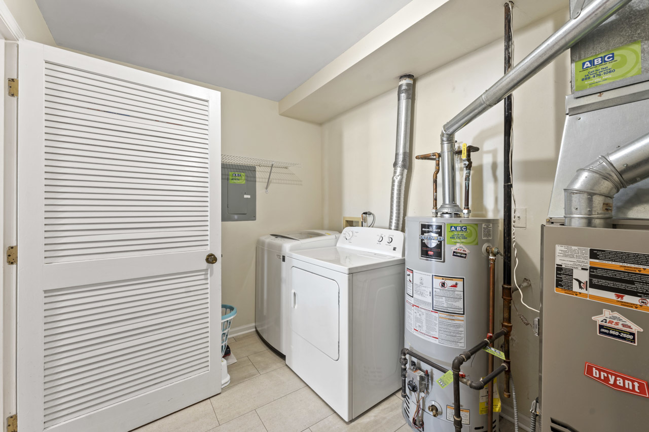 1265 Ranchview Court Buffalo Grove, IL 60089 - Photo 16 of 24 a utility room with dryer and washer