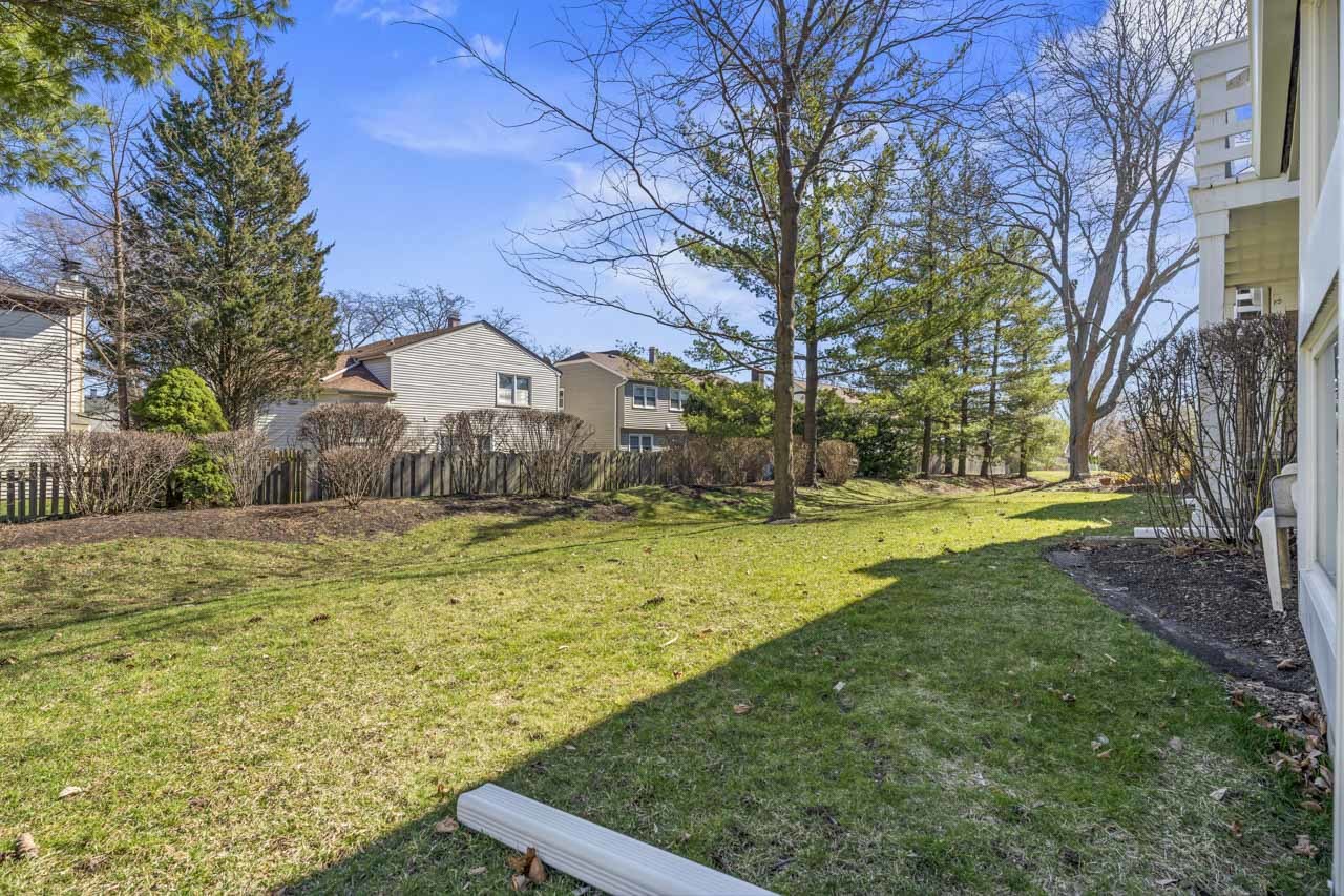 1265 Ranchview Court Buffalo Grove, IL 60089 - Photo 19 of 24 a view of a yard with an trees