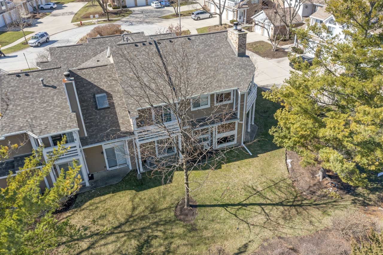 1265 Ranchview Court Buffalo Grove, IL 60089 - Photo 20 of 24 front view of a house with a yard
