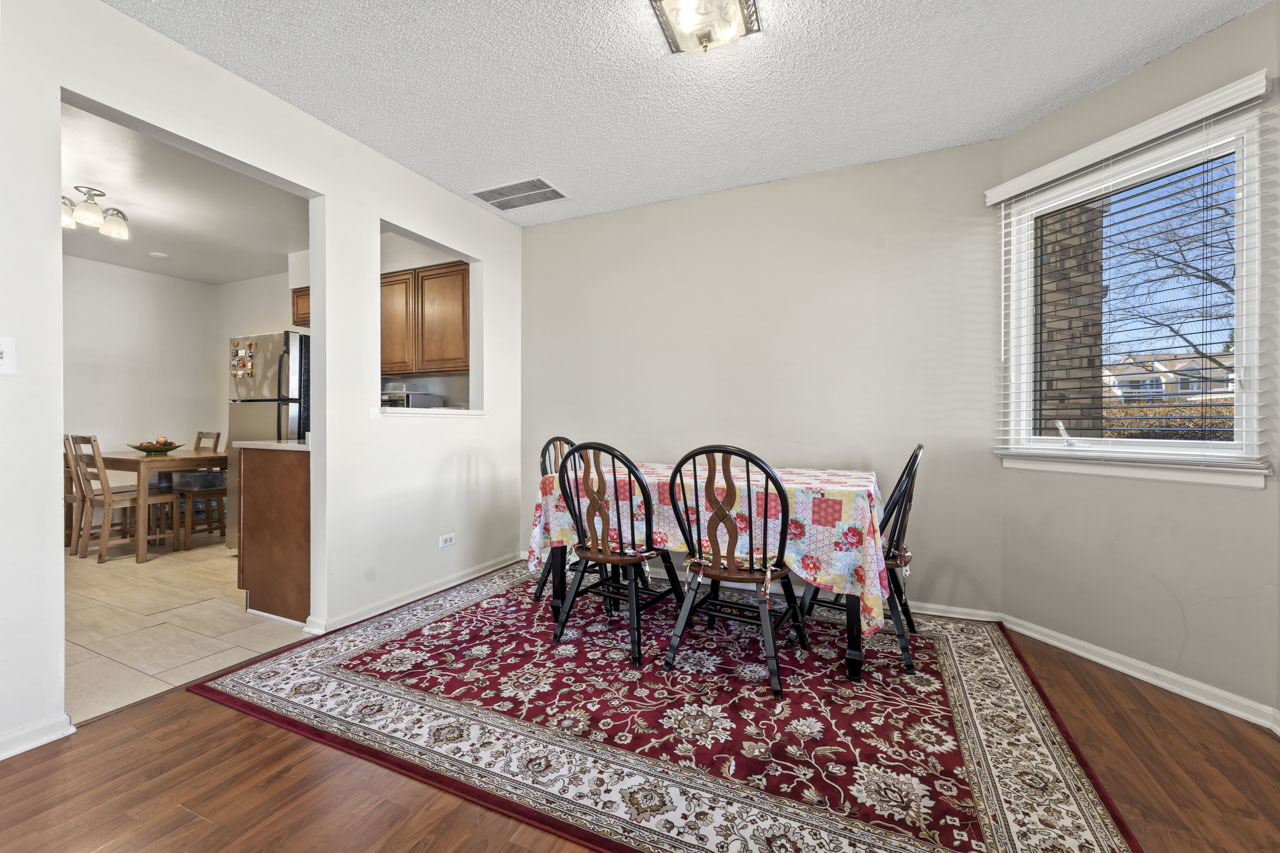 1265 Ranchview Court Buffalo Grove, IL 60089 - Photo 3 of 24 a view of a hallway to a livingroom with furniture