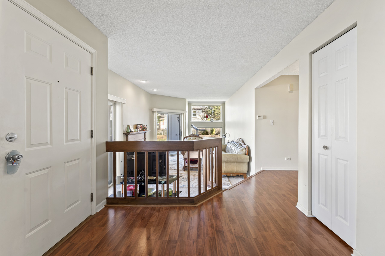 1265 Ranchview Court Buffalo Grove, IL 60089 - Photo 5 of 24 a bedroom with furniture and wooden floor