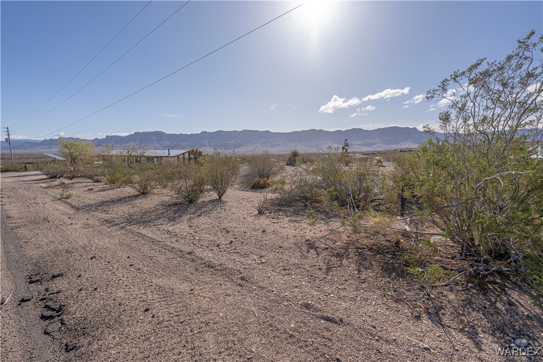 30430 Haystack Drive Meadview, AZ 86444 - Photo 2 of 20 a view of a dry yard with mountain