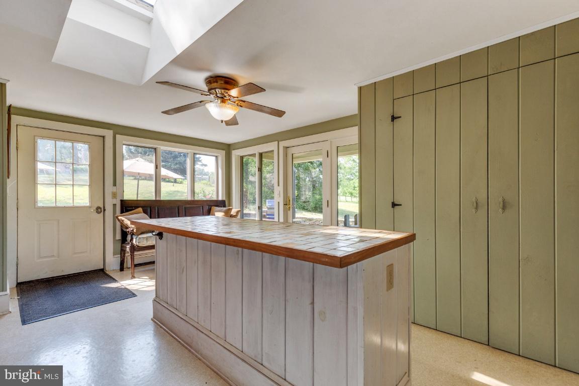 16191 Hamilton Station Road Waterford, VA 20197 - Photo 29 of 94 Extensive mud room with island and multiple closet