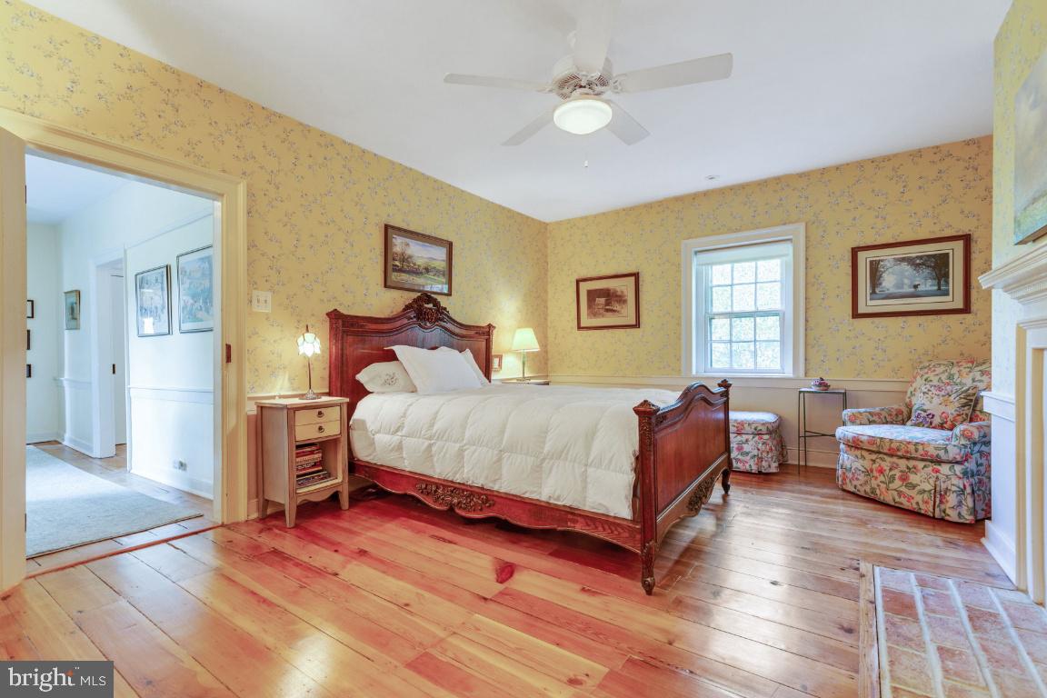 16191 Hamilton Station Road Waterford, VA 20197 - Photo 34 of 94 Primary bedroom with original hardwood floors